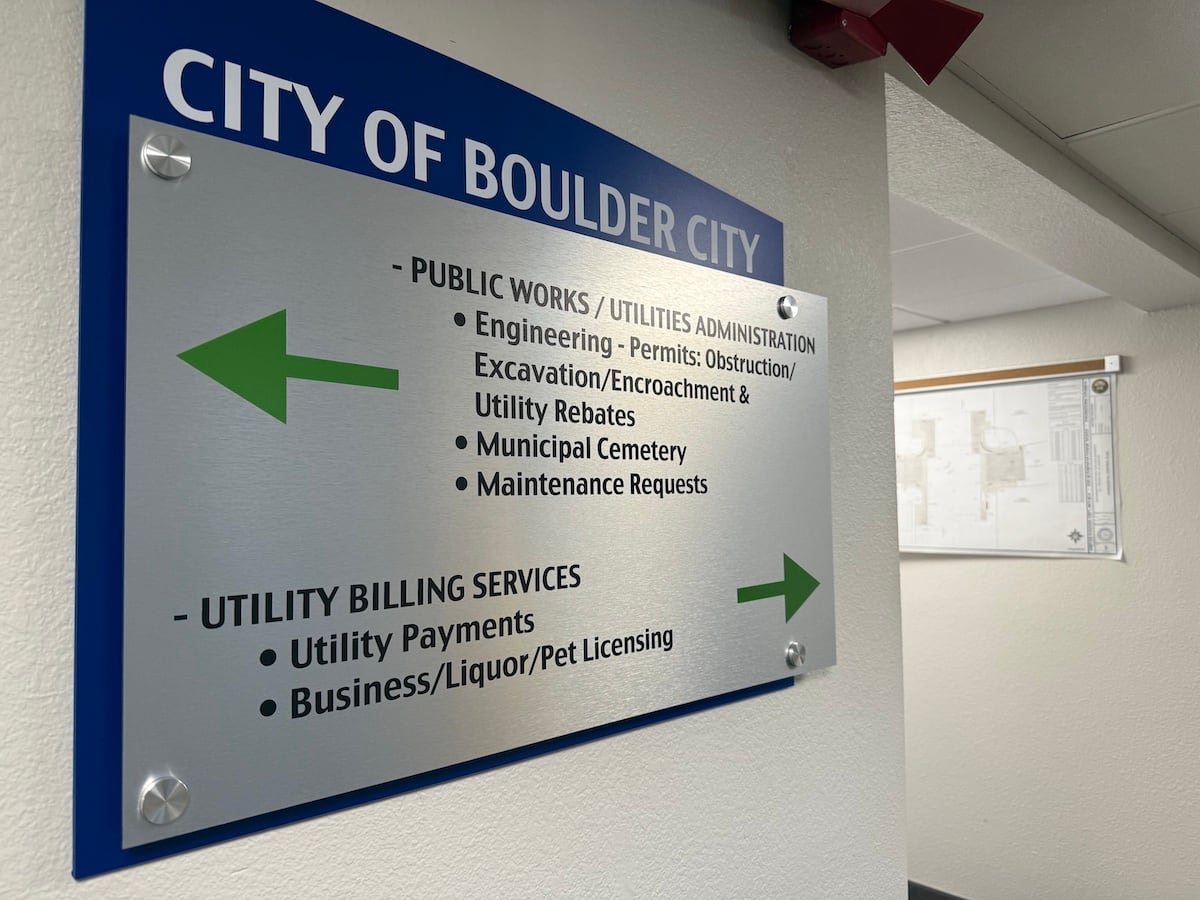 directory and directional sign City of Boulder City directory sign with department listings and directional arrows