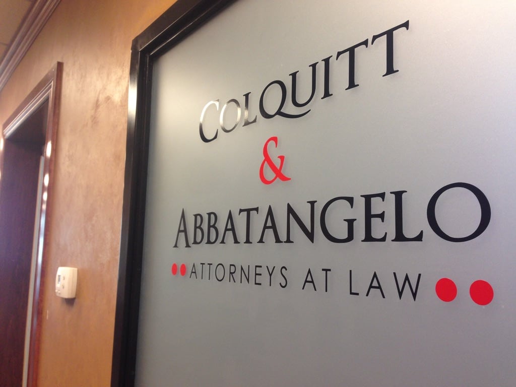 frosted glass window graphics Colquitt & Abbatangelo Attorneys at Law lettering on frosted glass