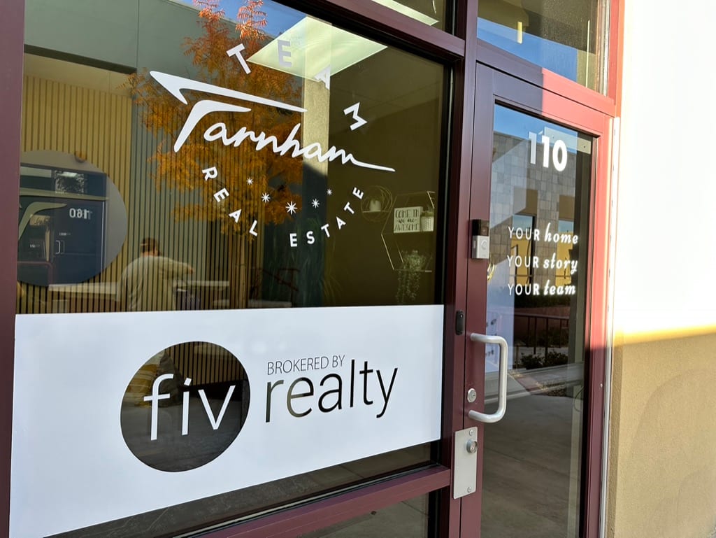 frosted window vinyl lettering las vegas Farnham Real Estate frosted window vinyl with fiv realty logo on a glass office front