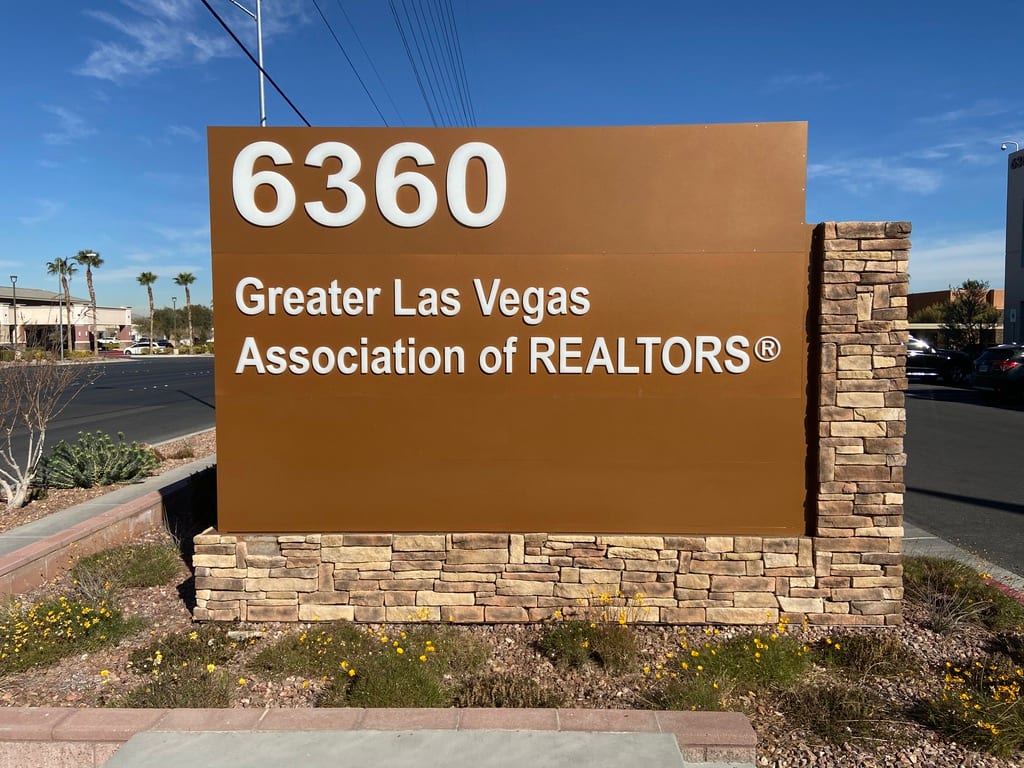 monument sign las vegas Greater Las Vegas Association of REALTORS monument sign on a stacked stone base