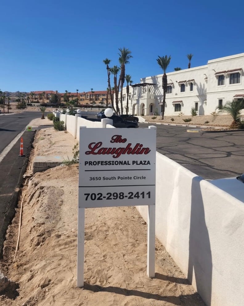 post and panel sign Post and panel sign for The Laughlin Professional Plaza at a new building site