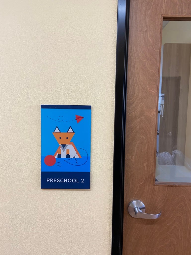 room identification sign Preschool 2 room identification sign with an illustration, beside a classroom door