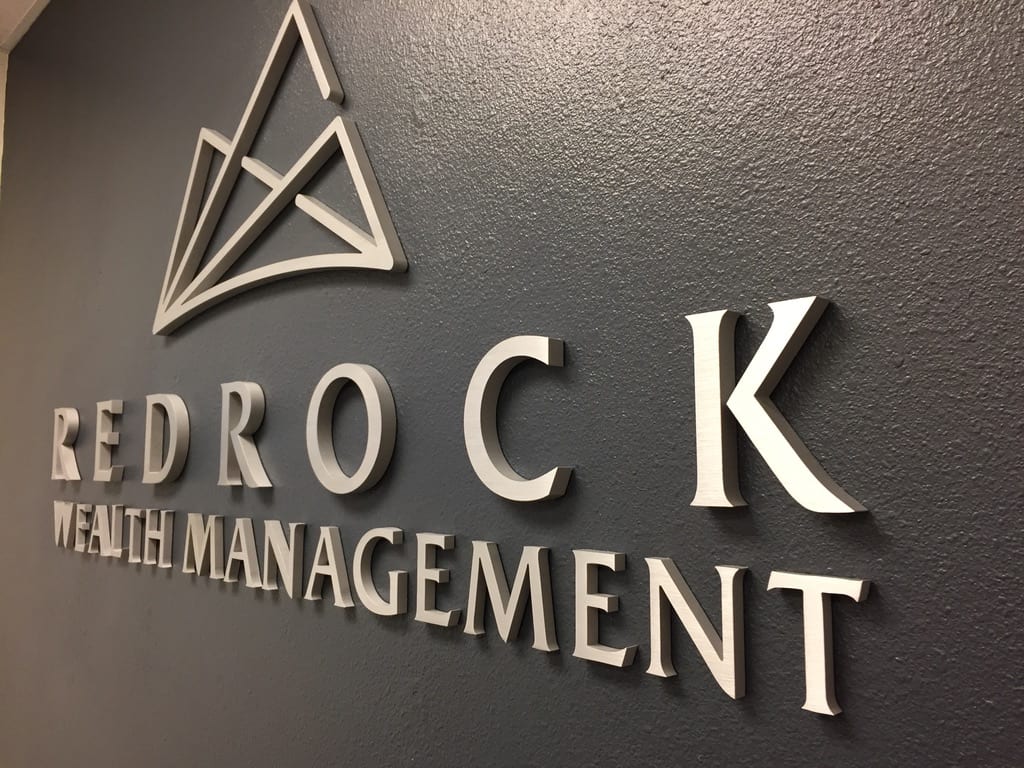 brushed metal letters wall sign Redrock Wealth Management wall sign in brushed metal letters