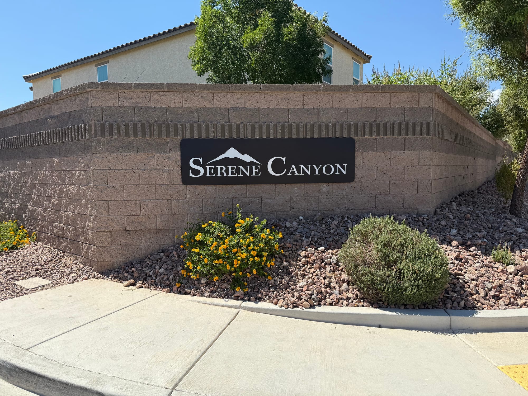 community entry sign Serene Canyon community entry sign on a block wall