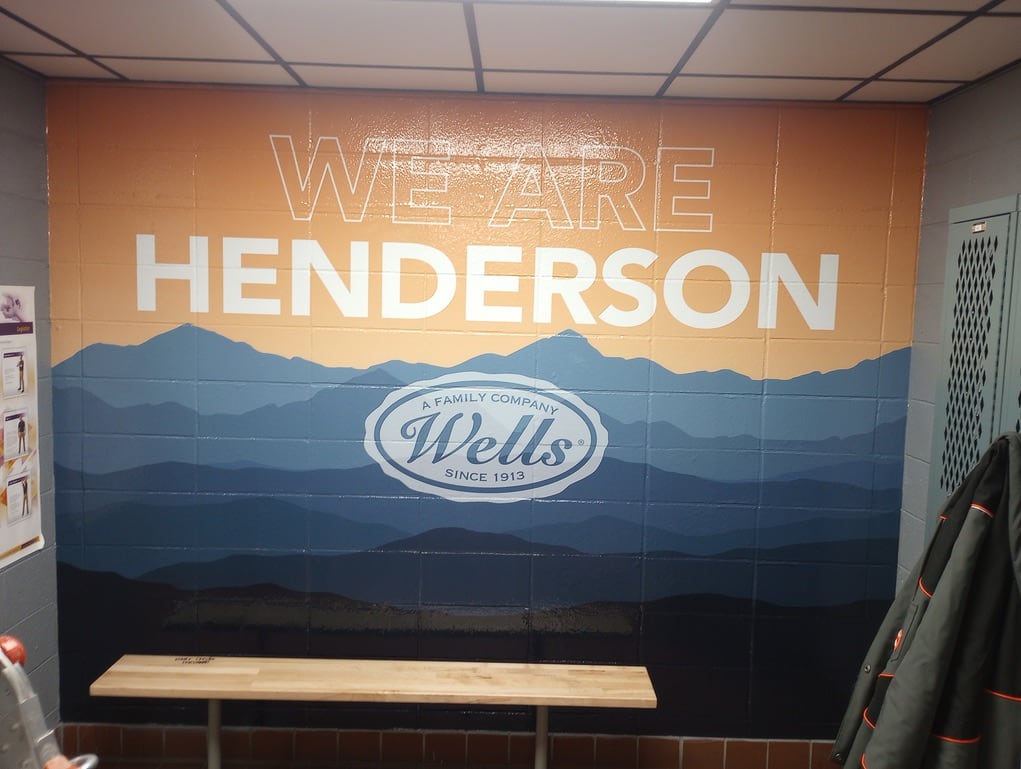 wall mural We Are Henderson wall mural with mountain silhouettes and the Wells logo